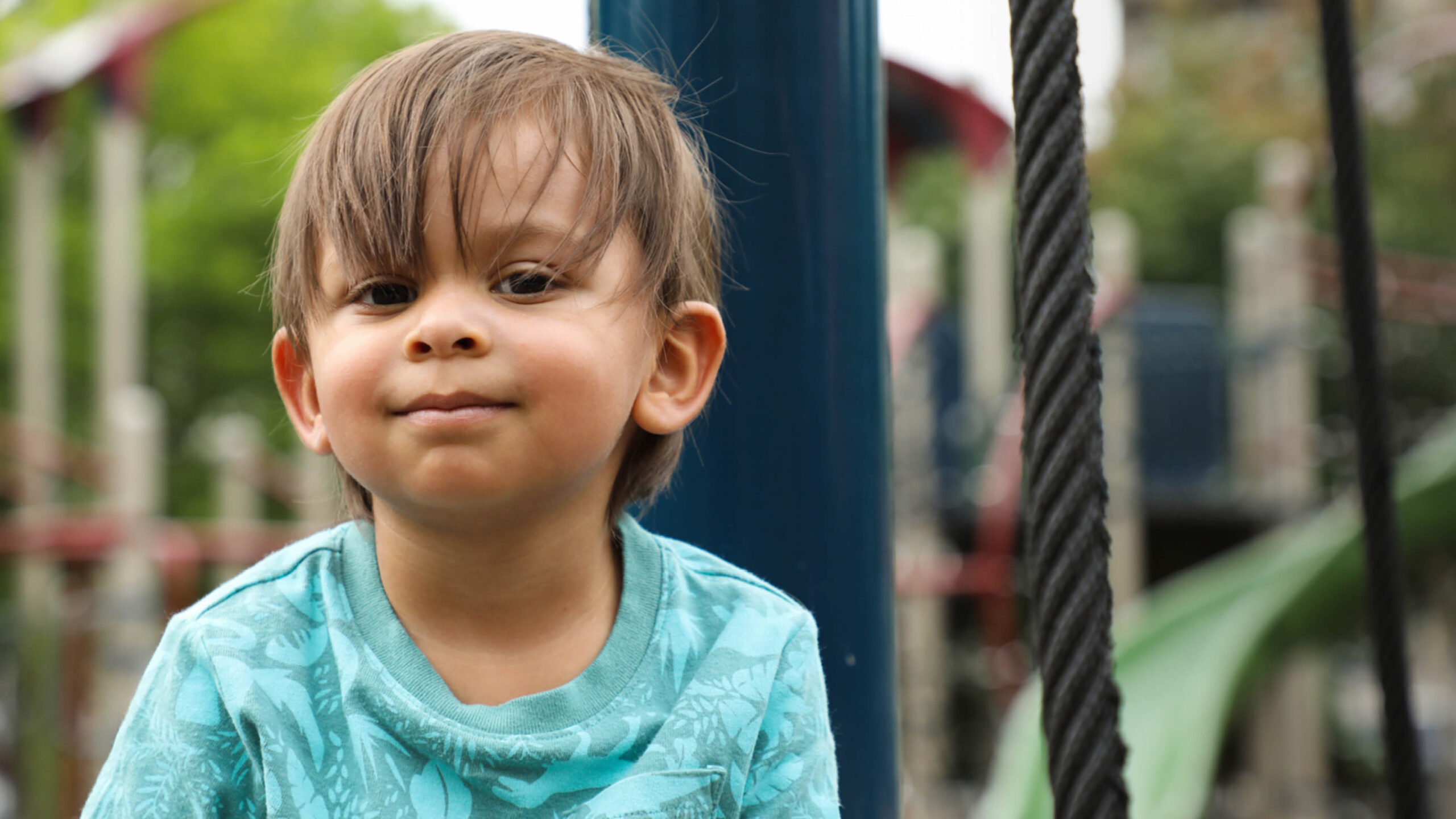 Photo of a child playing on a playground